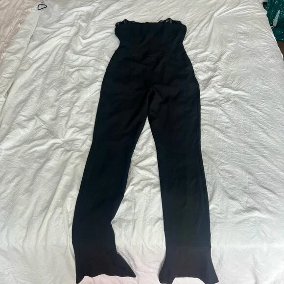 NWT RETROFETE JUMPSUIT